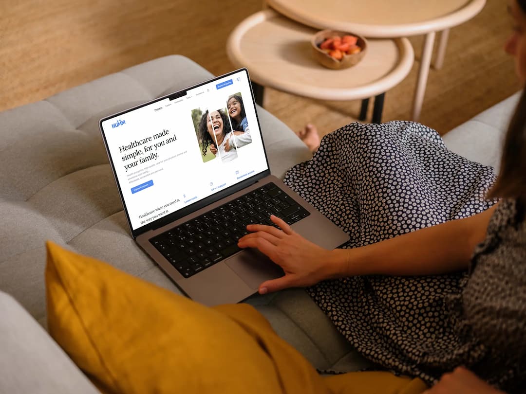 Healthcare professional using a laptop